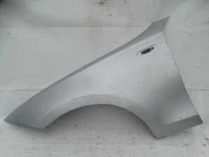BŁOTNIK LEWY PRZÓD PRZEDNI BMW E81 E82 E87 E88 F-VAT