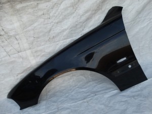 BŁOTNIK LEWY PRZÓD PRZEDNI BMW E39 SCHWARZ II F-VAT