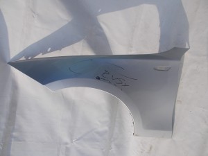 BŁOTNIK LEWY GOŁY TITANSILBER E87 F-VAT