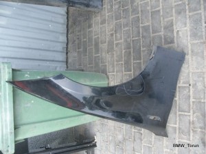BŁOTNIK PRAWY GOŁY SCHWARZ II E87 F-VAT
